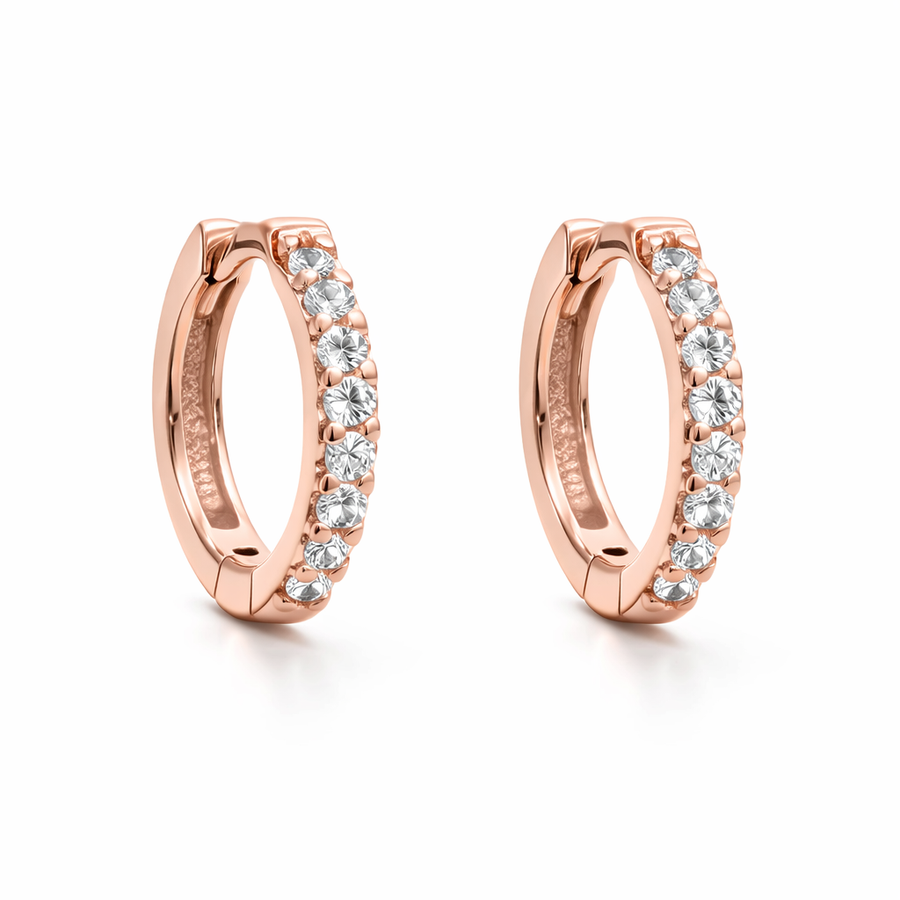 Boucles d'oreilles Huggies en or rose 10 kt avec zircons