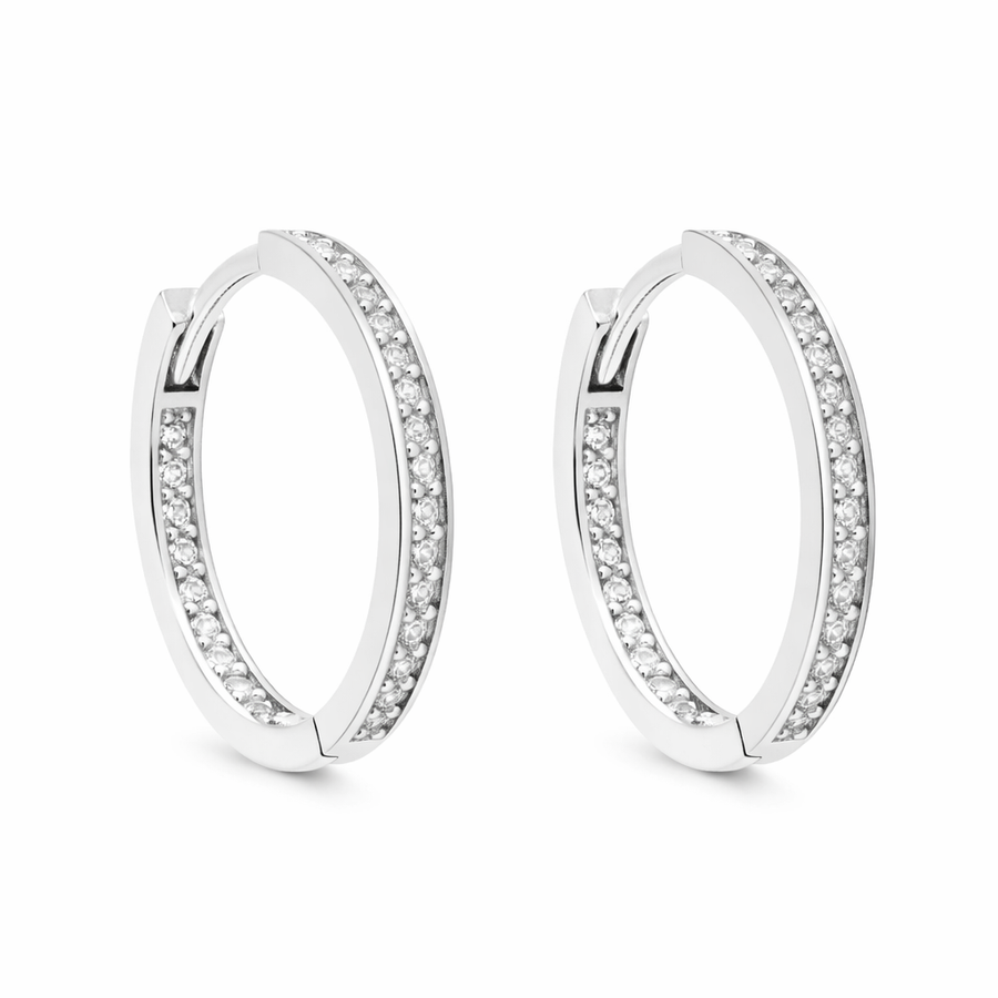 Boucles d'oreilles Huggies en or blanc 10 kt avec zircons