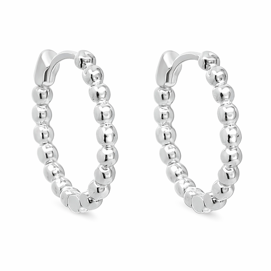 Boucles d'oreilles Boules blanches huggies en or blanc 10 kt
