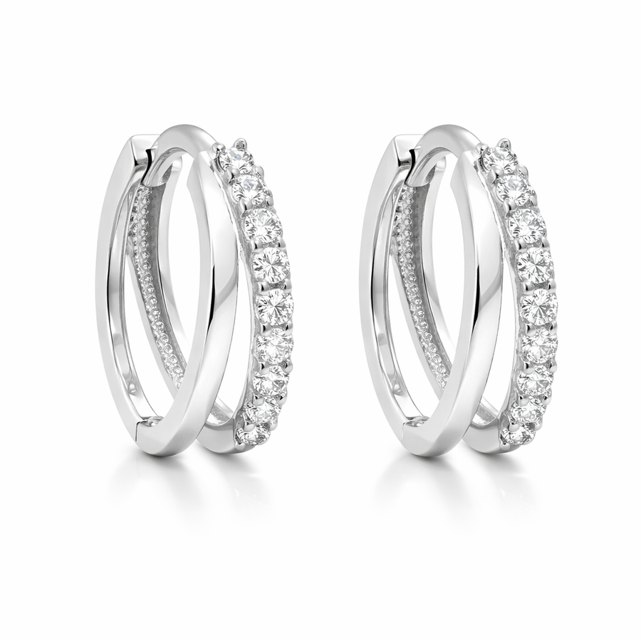 Boucles d'oreilles Huggies en or blanc 10 kt avec zircons