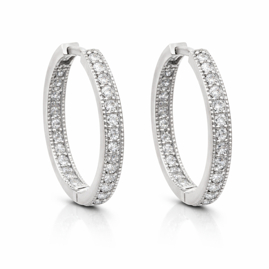 Boucles d'oreilles Huggies en or blanc 10 kt avec zircons